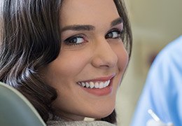 Smiling woman in dental chair