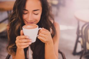 young woman with latte