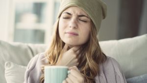 sick woman with tea