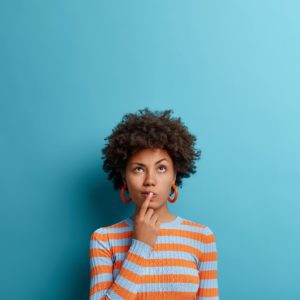 Woman wondering what it means when a toothache disappears