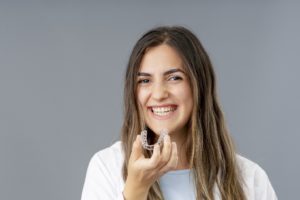 Woman happy with her decision to choose SureSmile over braces