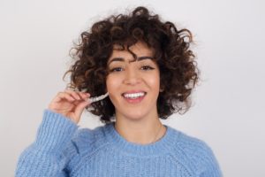 Smiling woman without cavities during SureSmile in Prestonsburg