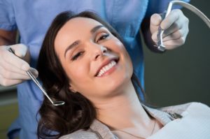 Woman attending a cleaning and checkup with her dentist in Prestonsburg